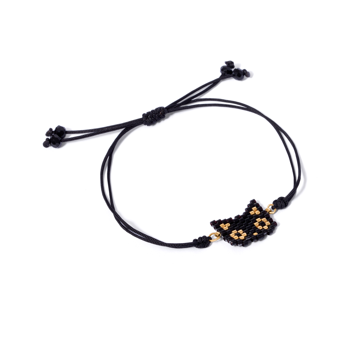 Gold bracelet woven with beads